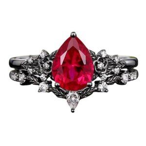 Pear Cut Ruby and Moissanite 2 piece Engagement Wedding Ring Set in Rhodium